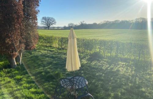 Pembridge House | Secluded Log Cabin in beautiful private gardens