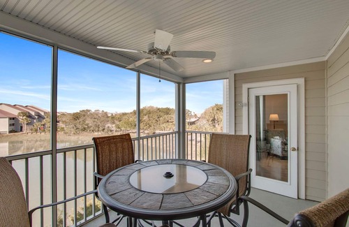 Folly Beach Villa | Second-floor condo with river views and access to a community pool