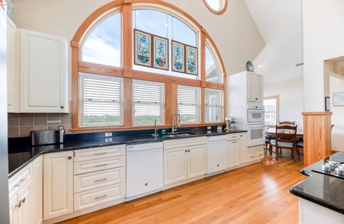 Ocean Isle Estates House | Semi oceanfront Avon home w/private pool, hot tub, elevator, & rec room!