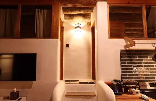 El Prado House | Serene Earthship near Taos w/Hot Tub, King Suite, Mountain Views & Outdoor Gym