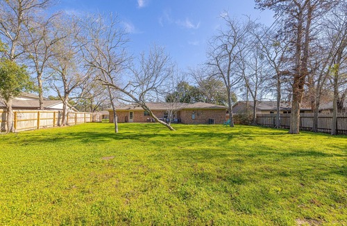Woodson Village - Pershing House | Serenity In The City With Huge Backyard 4 Bedroom Home by RedAwning