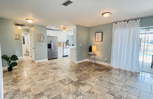 Eight Lakes House | Short Distance From Tarpon Point Marina! Gulf Access, Heated Pool, Dock & Tiki!