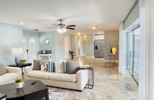 Eight Lakes House | Short Distance From Tarpon Point Marina! Gulf Access, Heated Pool, Dock & Tiki!