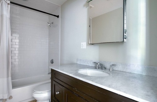 North Cambridge Apartment | Sleek Porter Square 1BR w/ Gym & W/D, nr T Stops, by Blueground