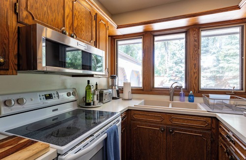 Fridley House | Soak, Relax & Gather - Spacious River Home - Hot Tub, Massage Chair & Kayaks