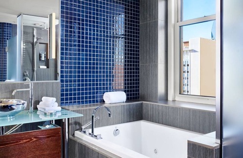 Downtown Dallas Hotel | Soaring Ceilings and Floor-to-Ceiling Views in a Modern Loft Retreat