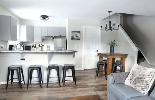 Harvie Heights Condo | Spa Serenity, BBQ Fun, Scenic Mountain Views