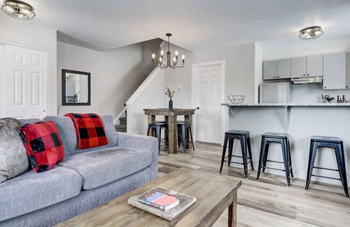 Harvie Heights Condo | Spa Serenity, BBQ Fun, Scenic Mountain Views