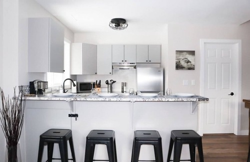 Harvie Heights Condo | Spa Serenity, BBQ Fun, Scenic Mountain Views