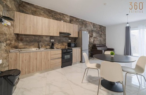 Tarxien Apartment | Spacious, 1BR home with comfortable bed in Tarxien