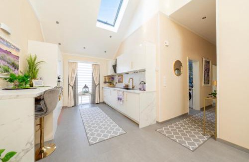 Helmsange Apartment | Spacious 3 Bedroom Home with Terrace and Free Parking