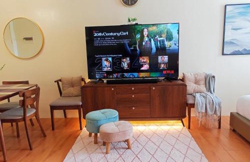 Sasa Apartment | Spacious 36sqm Studio with 65" TV Netflix Karaoke and Pool Access Near Airport and Samal Ferry