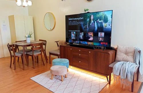 Sasa Apartment | Spacious 36sqm Studio with 65" TV Netflix Karaoke and Pool Access Near Airport and Samal Ferry