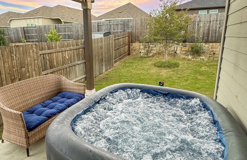 Buda House | Spacious 4BR Escape with Hot Tub, Laundry, and Pools in Buda.