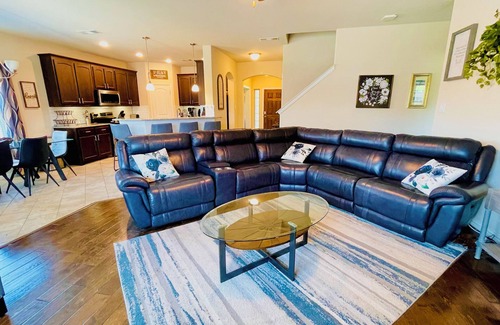 Ennis House | Spacious 5 Bedroom Home, Huge Swim Spa & Private Theater with Popcorn Machine!