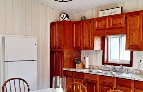 Coldwater Cottage | Spacious cottage, relaxing view, on channel frontage all sports/fishing lakes.