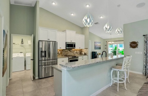 Palm Coast House | Spacious home with private hot tub, firepit, grill and 3 in 1 game table