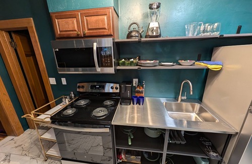 Sturgeon Bay Hotel | Spacious King Suite! Cher inspired unit.