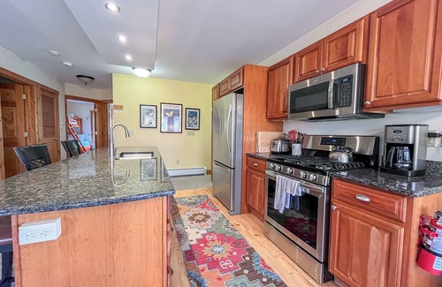 North Troy Condo | Spacious ski-in, ski-out 2-BR Jay Peak Village Condo, right on trail. A/C incl.!