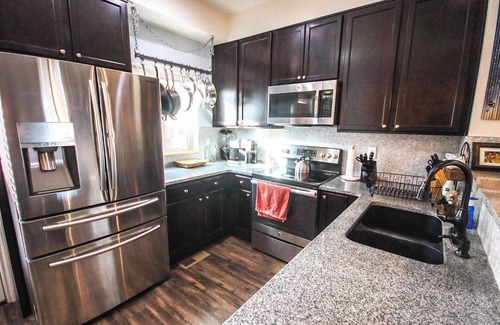 Longmont House | SpeakEasy Suite, relax in classic luxury with private living space and bedroom