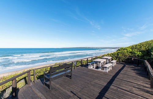 Boggoms Bay Villa | Spectacular ocean view with vibrant fynbos in the foreground.