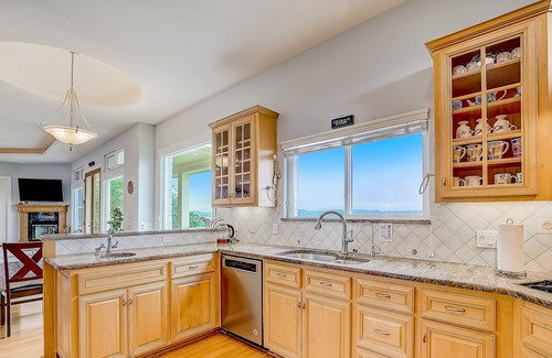 Travis Landing House | Sprawling private home with a large yard, water views, in-home gym, W/D, & AC