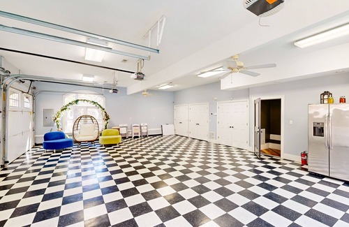 Chester County House | Sprawling property with a pool, hot tub, fireplaces, grill, retro bedroom, & AC