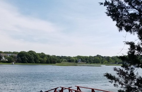 Gloucester House | Stanwood Point: Waterfront cottage with large screened porch, yard and dock