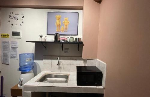 Diliman Apartment | Staycation residences hotel quality transient Netflix wifi international cable tv hi speed fiber internet sanitize