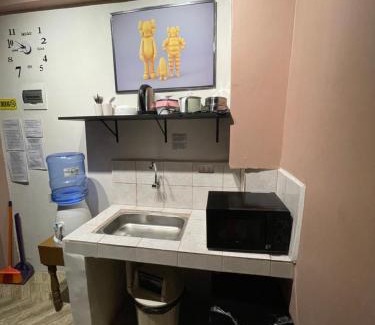 Diliman Apartment | Staycation residences hotel quality transient Netflix wifi international cable tv hi speed fiber internet sanitize