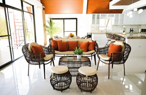 Bolinao Cabin | Step into an A-Frame home, where white tropical design meets ultimate comfort.