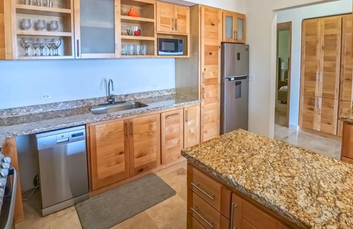 La Paz Condo | Steps from the Beach: Pool, Gym & Tennis Court