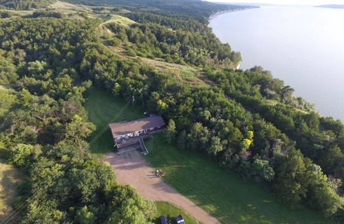 Chamberlain House | Steps from the water, firepit, large yard, family friendly