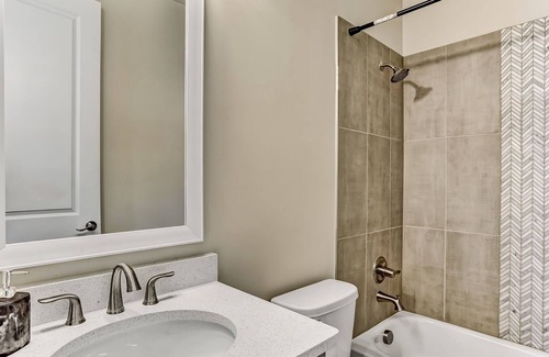 Hitch Village - Fred Wessels Homes House | Steps to River Walk! Includes Two Garage Parking Spots!