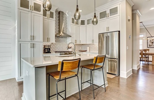 Hitch Village - Fred Wessels Homes House | Steps to River Walk! Includes Two Garage Parking Spots!