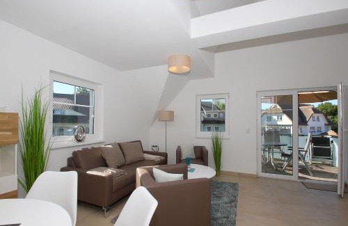 Lobbe Apartment | strandnahe FeWo mit Balkon, gratis Nutzung vom AHOI Erlebnisbad und Sauna in Sellin - Rex Rugia FeWo 13-7