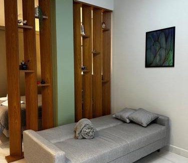 Regiao Urbana Homogenea X Apartment | Studio Aconchego Poços - Minimalista e bem localizado