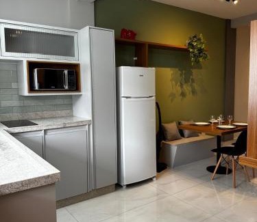 Regiao Urbana Homogenea X Apartment | Studio Aconchego Poços - Minimalista e bem localizado