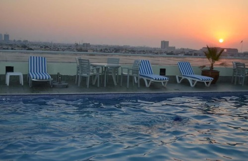 Al Mankhool House | Studio Apartment Near Manhattan Avenue By Luxury Bookings
