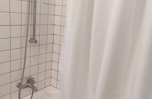 Pizol Apartment | Studio with bathroom and kitchenette