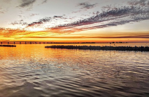 Grand Isle Condo | Stunning 2 bed 2 bath condo with wrap around balcony overlooking the marina.