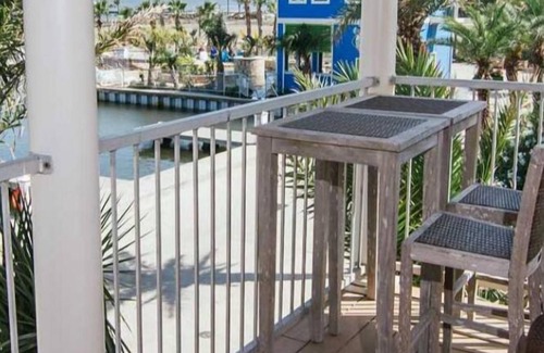 Grand Isle Condo | Stunning 2 bed 2 bath condo with wrap around balcony overlooking the marina.