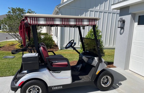 Sumter County House | Stunning new home with water view, screened lanai & golf cart!