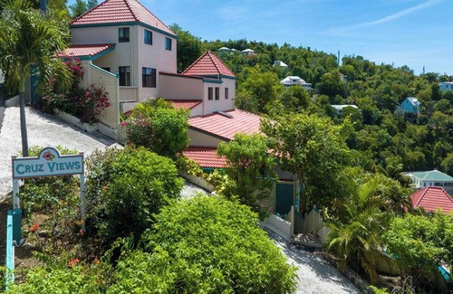 Estate Enighed Condo | Stunning Sunsets, Modern A/C, & Updated Living – Your Dream Condo Awaits!