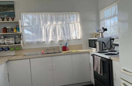 Castlepoint House | Stunning unobstructed views, from the lighthouse to beyond the Matakona