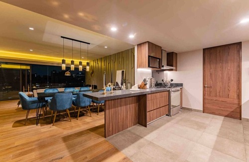 Granada Condo | Stylish 3-Level Penthouse with Private Rooftop