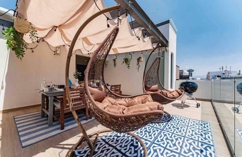 Granada Condo | Stylish 3-Level Penthouse with Private Rooftop