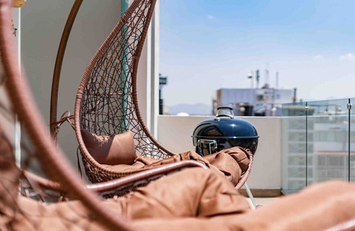 Granada Condo | Stylish 3-Level Penthouse with Private Rooftop