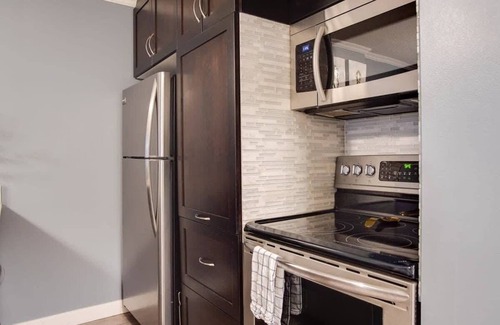 Eau Claire Apartment | Stylish City Center Apt | Free WiFi & Parking