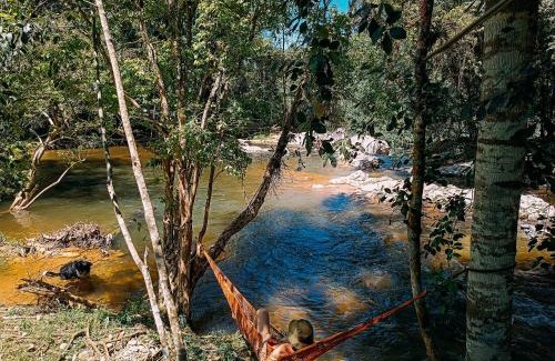 Antonio Carlos Cabin | Suíte com cachoeira no quintal